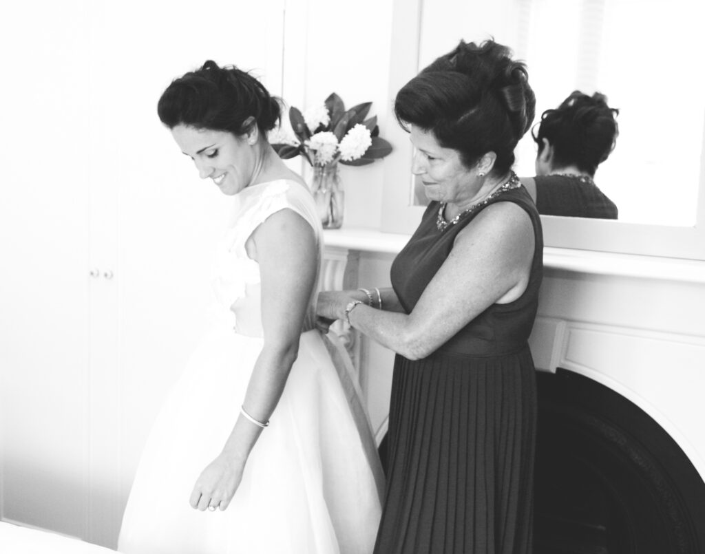 mother and daughter getting ready before wedding