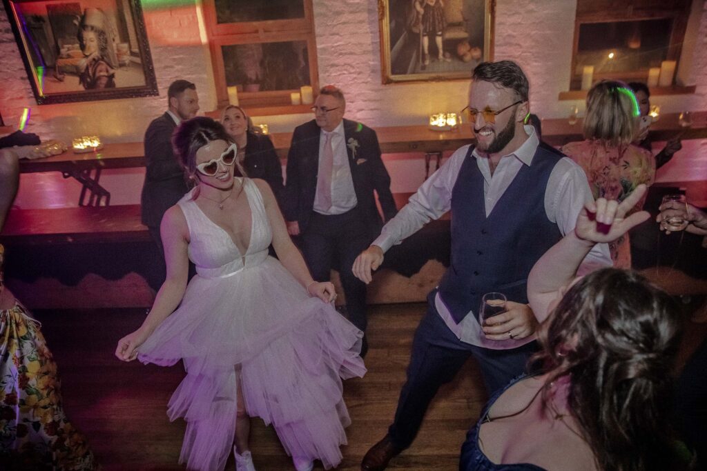 Bride and groom dancing at wedding reception