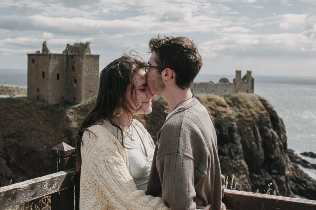 Engagement photo of couple at Dunnotter Castle