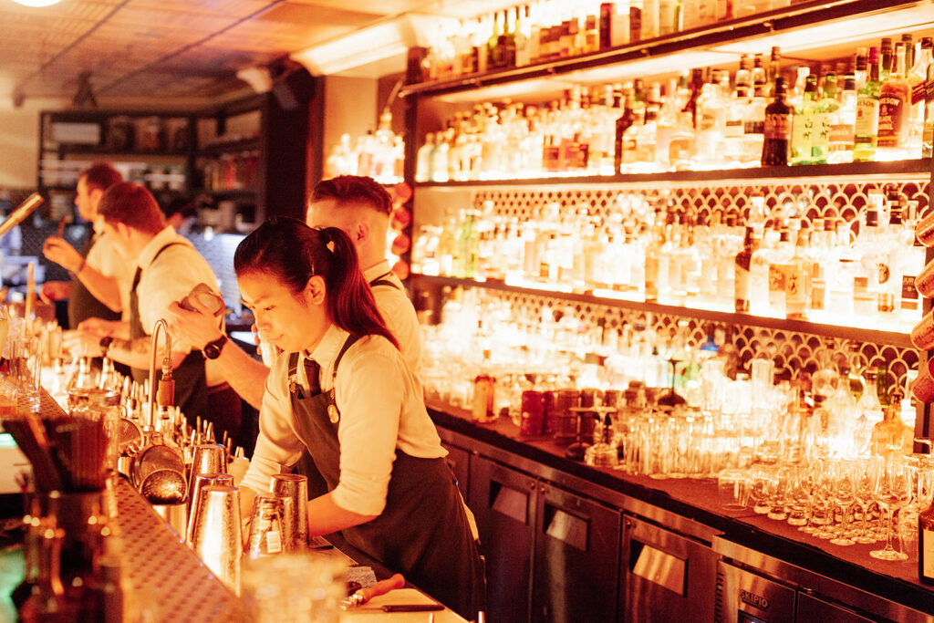 Nick and Noras cocktail bar, for a intimate wedding in Melbourne. Fun reception. Fun party wedding. candid wedding reception photos.