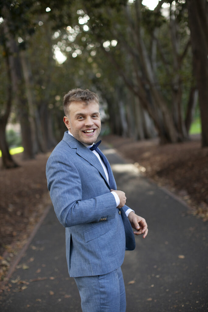 A Melbourne Elopement followed by a  Panama Dining Room Wedding. a Couple having wedding photos in Treasury gardens