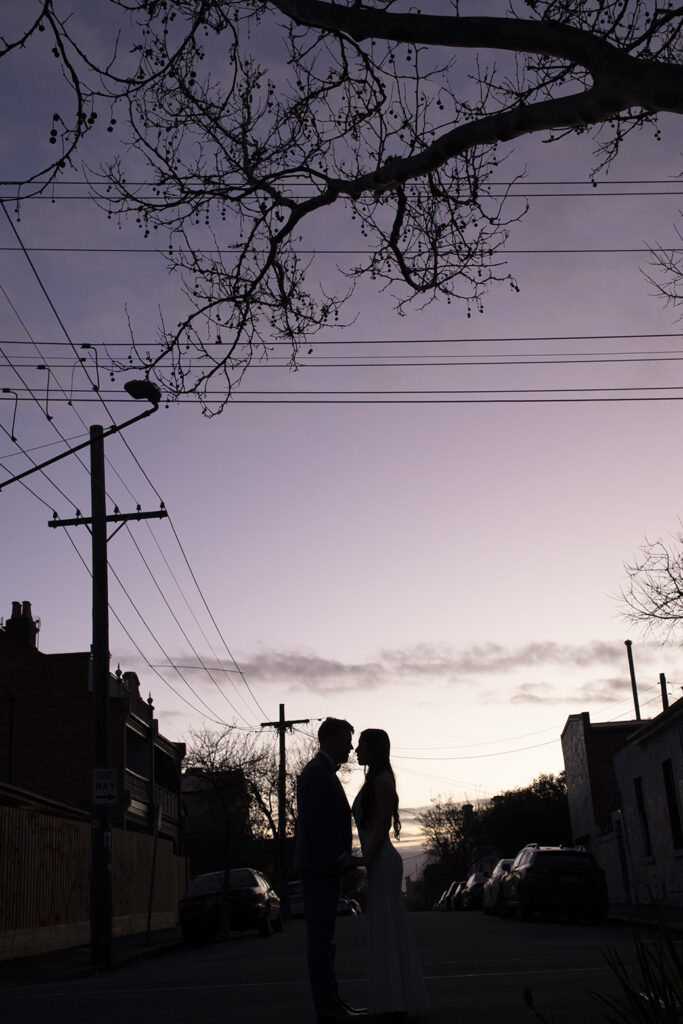 A Melbourne Elopement followed by a  Panama Dining Room Wedding. a Couple having wedding photos in down the laneways streets of Melbourne