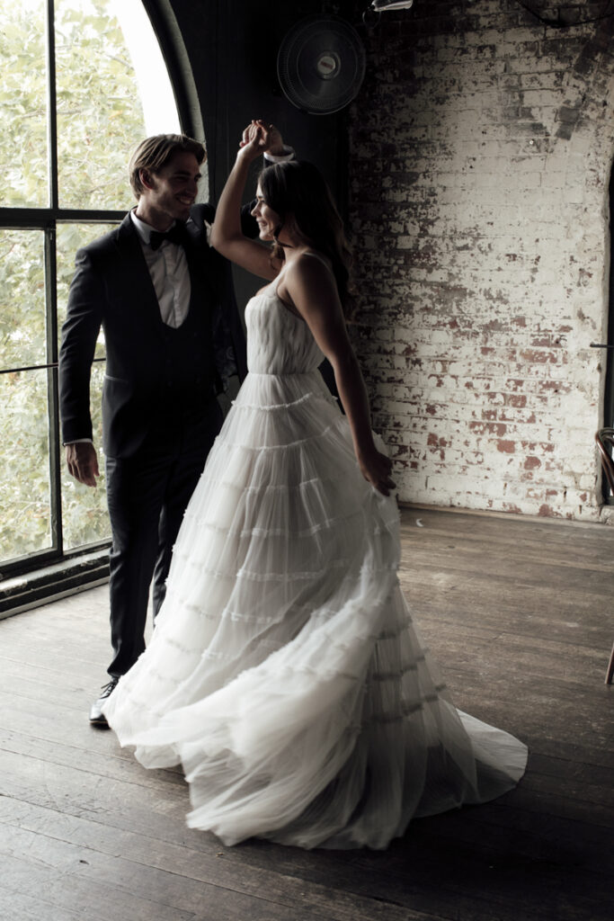 Panama Dining Room Melbourne wedding photography. A couple having their wedding photos taken in Panama Dining room, that are happy and laughing.