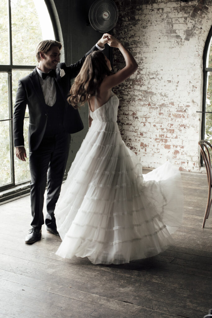 Panama Dining Room Melbourne wedding photography. A couple having their wedding photos taken in Panama Dining room, that are happy and laughing.