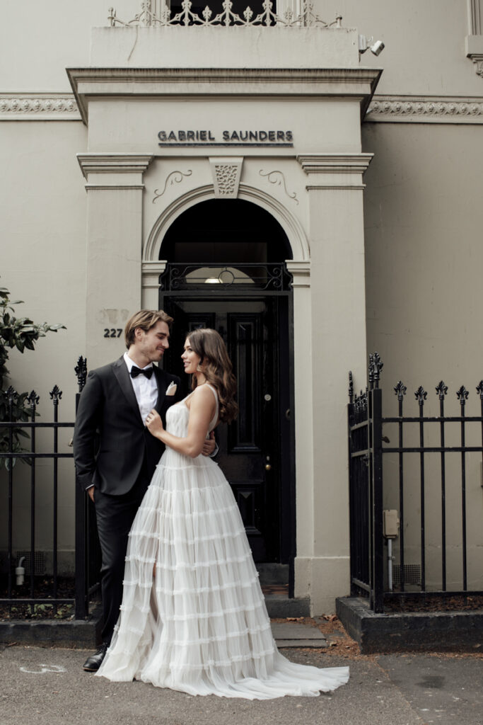 Panama Dining Room Melbourne wedding photography. A couple having their wedding photos taken in Panama Dining room, that are happy and laughing.