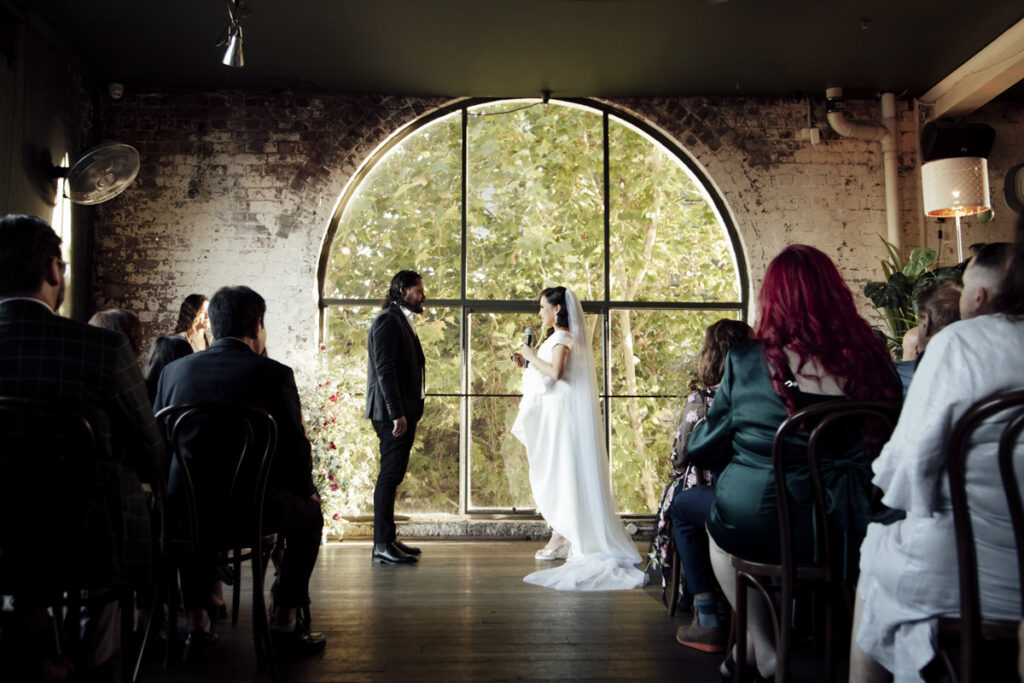Panama Dining Room Melbourne wedding photography. A couple having their wedding photos taken in Panama Dining room, that are happy and laughing.