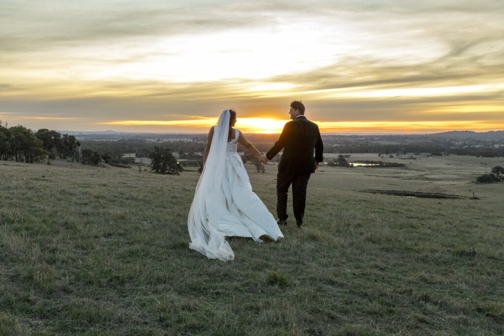 Paramoor Melbourne wedding photography. A couple having their wedding photos taken in Paramoor wineryl, that are happy and laughing.