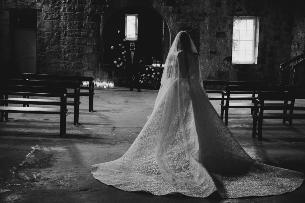 Provenance wedding photography. A couple having their wedding photos in a unique wedding venue, taken in Provenance in the grand Hall.
