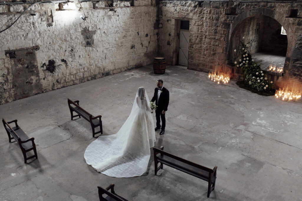 Provenance wedding photography. A couple having their wedding photos in a unique wedding venue, taken in Provenance in the grand Hall.