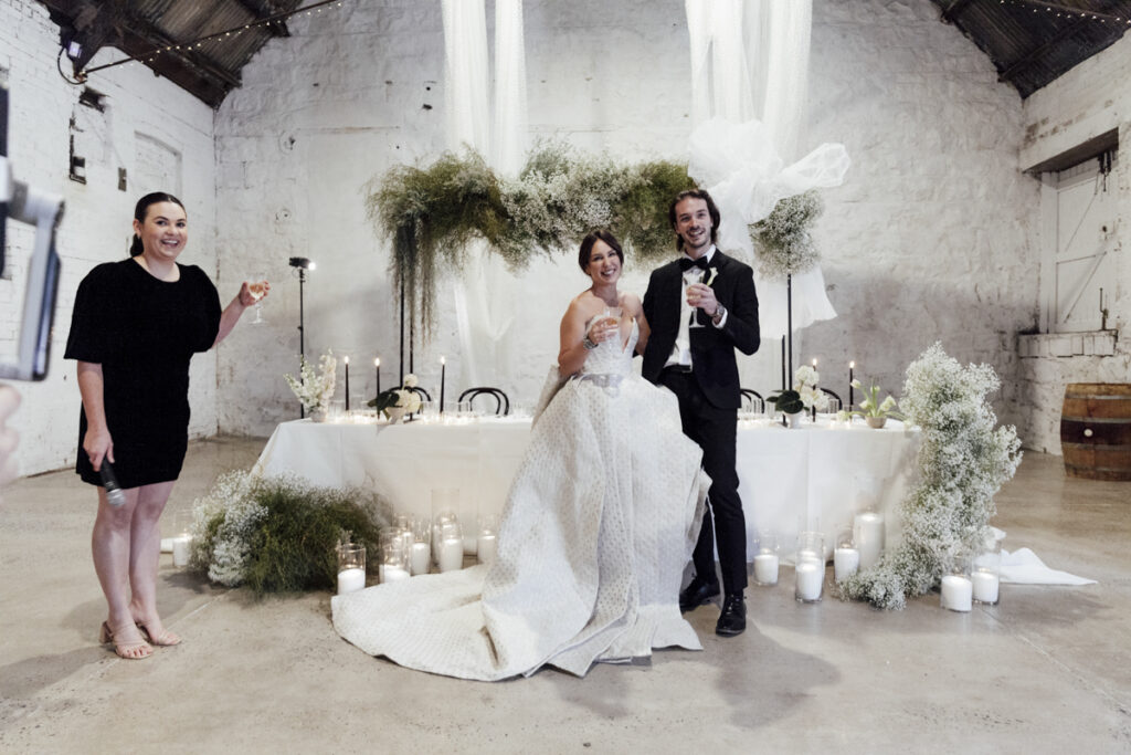 Provenance wedding photography. A couple having their wedding photos taken in Provenance, that are happy and laughing. Dancing on the dance floor