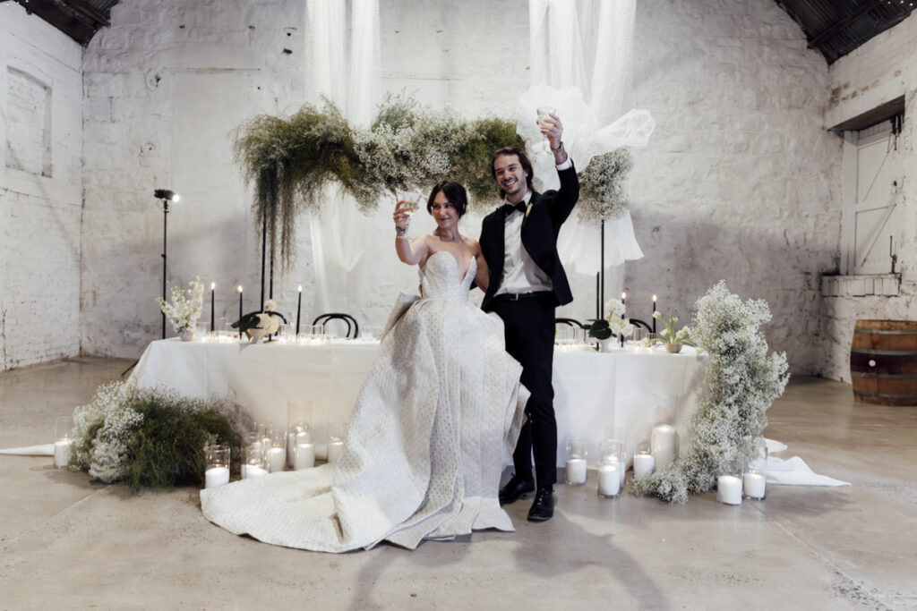Provenance wedding photography. A couple having their wedding photos taken in Provenance, that are happy and laughing. Dancing on the dance floor