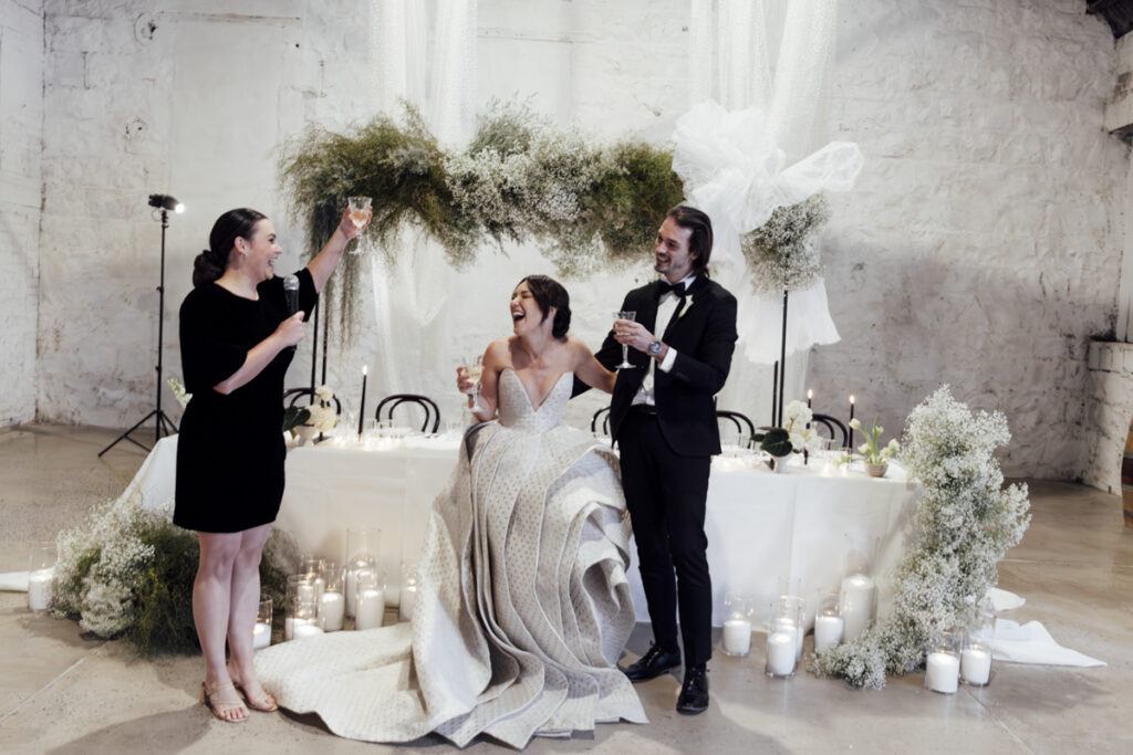 Provenance wedding photography. A couple having their wedding photos taken in Provenance, that are happy and laughing. Dancing on the dance floor