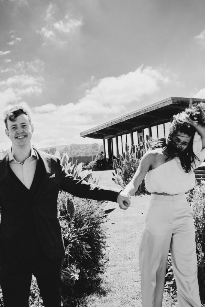Gurney Cidery Wilsons Prom wedding photography. A couple having their wedding photos taken in Gurney Cidery, that are happy and laughing.