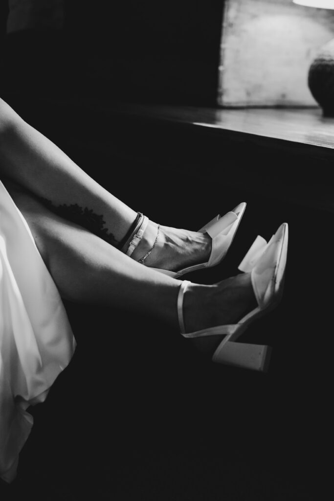 Emu Bottom Homestead wedding photography. Macedon Ranges Wedding photographer. A couple having portraits through a window. Sunbury Wedding photorpaher