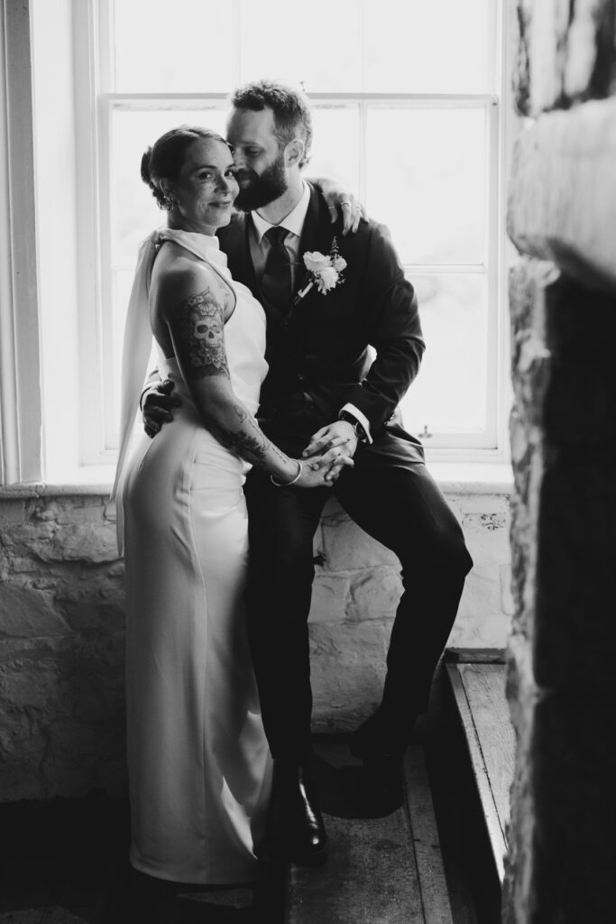 Emu Bottom Homestead a black and white image inside the historic homestead. Bride and groom. black and white photography.