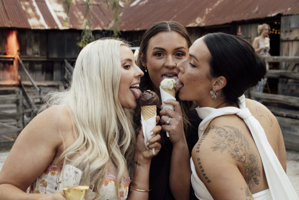 a bride and groom eating gelato at Emu Bottom homestead. Macedon Ranges wedding photographer