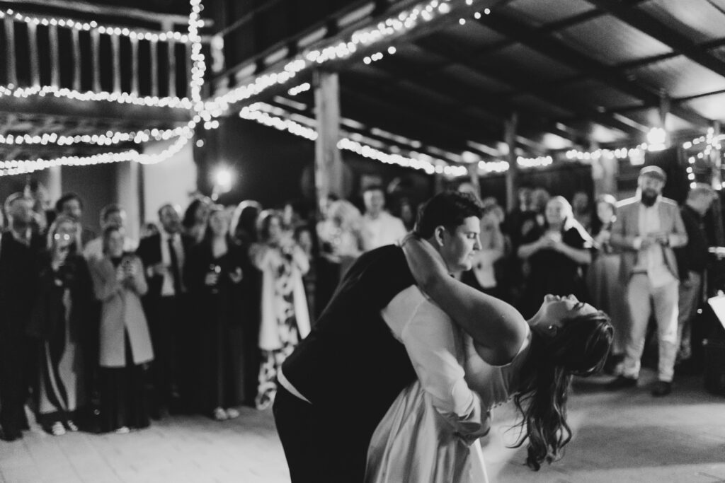 Bride and groom laughing at wedding reception during first dance. Macedon Ranges wedding photography
