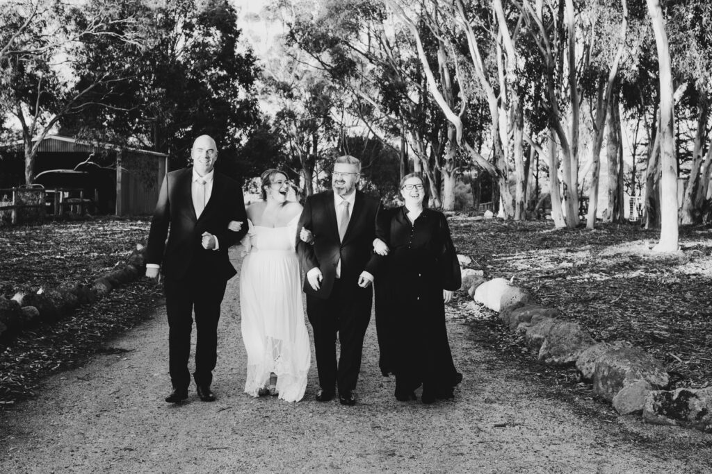 Warrawong estate wedding. Macedon Ranges Wedding photographer. Bride and Groom having photos taken at golden hour. Golden hour light in Macedon Ranges.