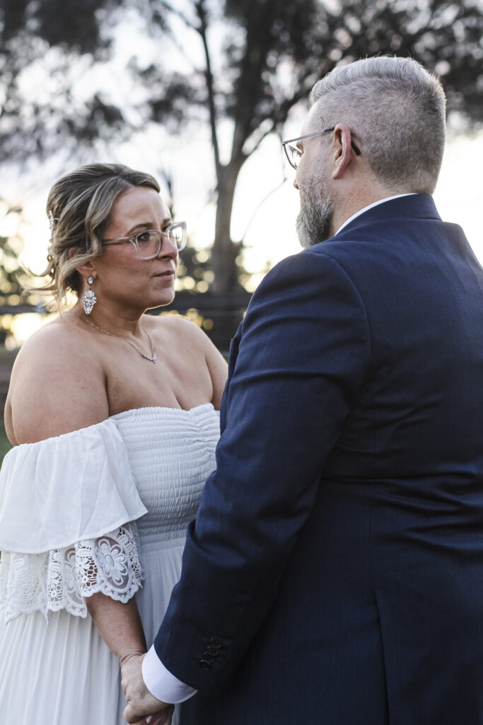 Warrawong estate wedding. Macedon Ranges Wedding photographer. Bride and Groom having photos taken at golden hour. Golden hour light in Macedon Ranges.