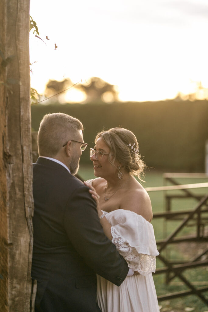 Warrawong estate wedding. Macedon Ranges Wedding photographer. Bride and Groom having photos taken at golden hour. Golden hour light in Macedon Ranges.