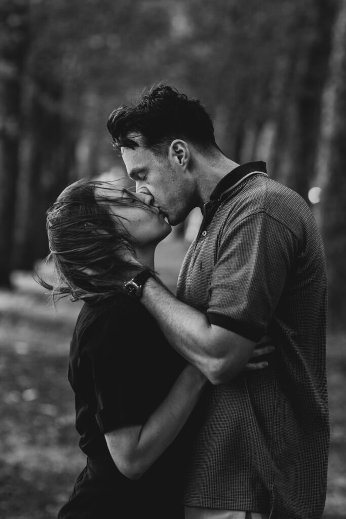 Fitzroy gardens proposal. Melbourne Proposal photography. A Proposal in Melbourne. Proposal Photographer. Engagement photographer in Melbourne. a Young couple laughing and holding hands. Candid Documentary Photography 