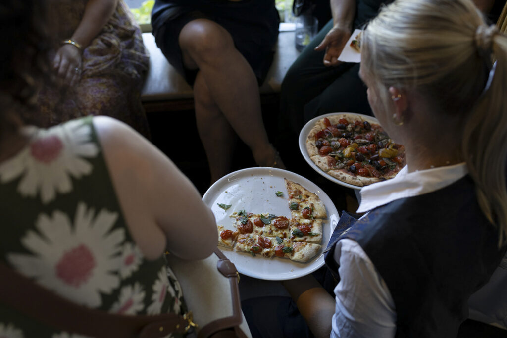 Wedding reception at the village Grae in Kew in the courtyard. The Magic of a Wine Bar Wedding in Melbourne