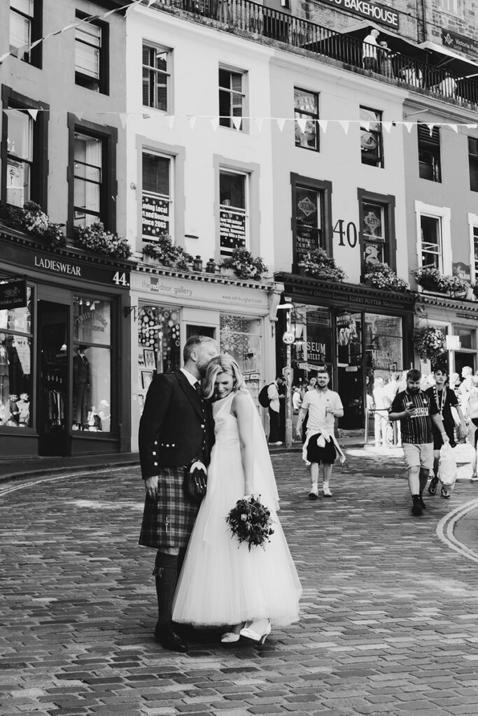 Black and white photo bride and groom in edinburgh happy